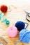 Knitting background, yarn with accessories