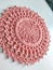 Knitting crochet doily napkin cotton pink yarn thread hook craft creative closeup macro photo