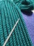 Knitting crochet wool acrylic green violet yarn thread hook craft creative closeup macro photo