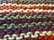 Knitting. Knitted multicolored fabric. Knitting texture. Close-up. Background image. Hobbies, leisure, crafts