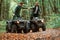 Knocking fists, gesture. Two male atv riders is in the forest together