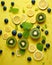 knolling fruits on colorful surface