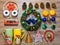 Knolling for New Year or Christmas theme. Christmas wreath, cones, tangerines, Christmas tree decorations, cups with a fox and an