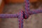 Knot on a colorful rope. Tools for climbing.