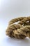 Knot of hemp rope close-up on a white background