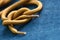 Knot of laces on denim, shallow depth of field