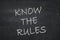 Know the rules written on chalkboard