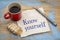 Know yourself concept on napkin with coffee