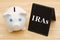 Knowing your IRA options with piggy bank