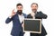 He knows better. Happy men hold blackboard isolated on white. Professional men pointing and gesturing ok. Bearded men