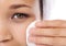 She knows the importance of skincare. Closeup of a young woman cleansing her skin with a cotton pa.