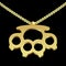 Knuckle duster golden pendant necklace vector illustration, isolated on black background