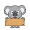 Koala holding a plank of wood