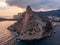 Koba-kaya mountain in sea in Crimea, large rock at beautiful sunset and seascape nature landscape, aerial panoramic view