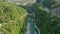 Kobarid, Slovenia - 4K Aerial footage about drone flying above River Soca from Napoleon`s Bridge on a sunny summer aftwernoon