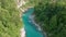Kobarid, Slovenia - 4K Aerial footage about drone flying above River Soca on a sunny summer aftwernoon