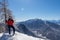 Kobesnock - Woman with scenic view of snow capped mountain peak Dobratsch, Julian Alps and the Karawanks, Austria