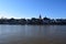 Koblenz, Germany - 02 27 2022: Long cargo ship on the Mosel at old town Koblenz