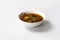 Kofta Curry, Delicious Meat Balls in thick spicy gravy in bowl on white background