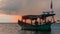 Koh Rong Island, Cambodia at Sunrise. strong vibrant Colors, Boats and Ocean