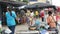 KOH SAMUI ISLAND, THAILAND - 10 JULY 2019: Food market for locals. Lively ranks with groceries. Typical daily life on the street