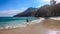 Koka Beach - A man running along the waves