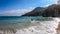 Koka Beach - A man running along the waves