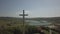 Kolaczyce, Poland - may 10, 2018: A huge statue of the crucified Christ on a hill in the middle of the settlements. Religious sign