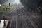 KOLHAPUR, MAHARASHTRA, October 2018, People crossing railway tracks during morning, perspective view, danger