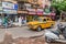 KOLKATA, INDIA - OCTOBER 27, 2016: View of yellow Hindustan Ambassador taxi in the center of Kolkata, Ind