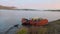 Kolyma. Autumn. Dawn. Lake Hinike. The boat is ready to go camping