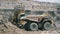 Komatsu PC4000 electric excavator loads ore into a BelAZ dump truck.