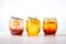 Kombucha drinks. Set of glasses with different kombucha made of yeast, sugar and tea with addition of fruits, berries, lemon and