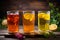 Kombucha drinks. Set of glasses with various kombucha tea made of yeast, sugar and tea with addition of fruits, berries, lemon and