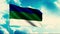 Komi Republic.Motion.Tricolor flag on a blue sky background.