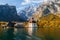 Konigssee lake Konigsee in foggy weather, St. Bartholoma church the background Watzmann mountains , near the German Austrian