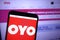 KONSKIE, POLAND - December 07, 2019: Oyo Rooms hotel chain logo on mobile phone