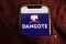 KONSKIE, POLAND - July 22, 2021: Dangote Cement Plc logo on mobile phone