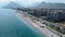 Konyaalti Beach in Antalya. Turkey. Sea and Embankment. Aerial Vertical Top-Down View. Drone Flies Sideways