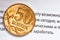 Kopeika coin macro with financial text background (words opport