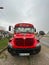 Koper, Slovenia. Red tourist bus on the Slovenian coast, related to the wine fountain. Holiday concept