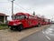 Koper, Slovenia. Red tourist bus on the Slovenian coast, related to the wine fountain. Holiday concept