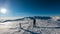 Kor Alps - Woman in snowshoes on the way to majestic summit peak Grosser Speikogel in Kor Alps, Lavanttal Alps