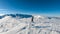 Kor Alps - Woman in snowshoes on the way to majestic summit peak Grosser Speikogel in Kor Alps, Lavanttal Alps