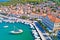 Korcula. Town of Vela Luka on Korcula island waterfront aerial view