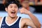 Korean basketball player Jinsu Park encourages his teammates