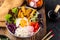 Korean Bibimbap. Bowl with meat, rice and salad