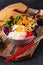 Korean Bibimbap. Bowl with meat, rice and salad