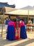 A korean bride arrives at the kunbere where the bride and groom bow to each other and seal their vow