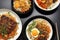 Korean cuisine. Bibimbap - Korean rice dish with fried egg and vegetables. Generative AI